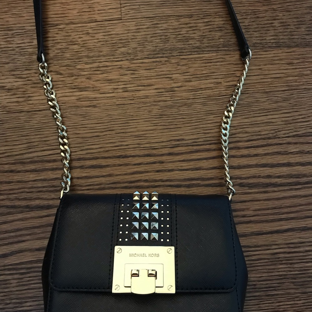 Black and gold Michael Kors satchel bag